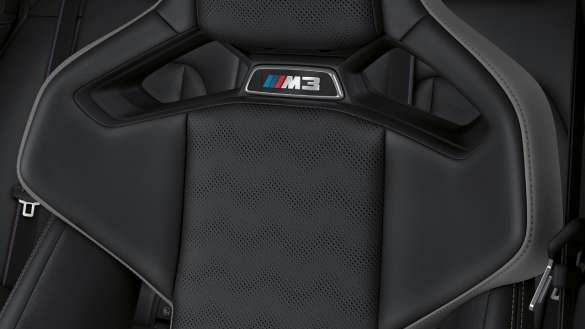 BMW M3 Competition Touring G81 Vollleder 'Merino' Schwarz Nahaufnahme M Carbon Schalensitz mit M3 Logo
